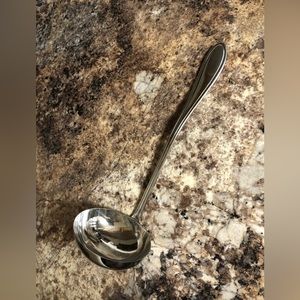 Large silver ladle